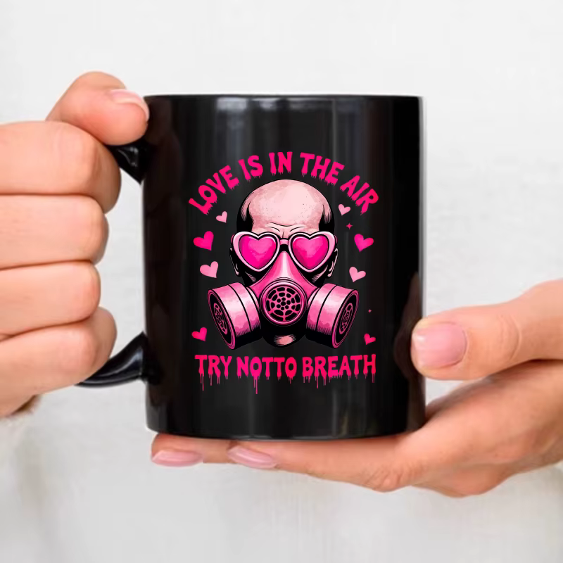 Tasse à café noire, amour dans l'air, masque à gaz en forme de cœur et texte rose, essayez pas respi