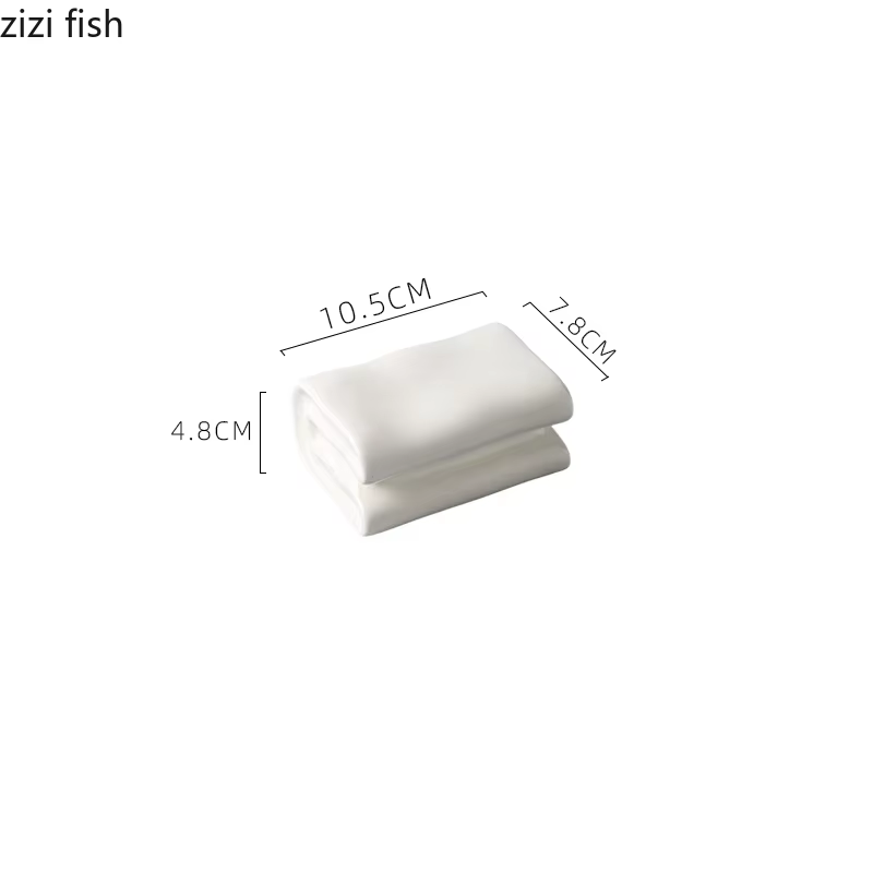 Assiette en céramique blanche en forme de livre