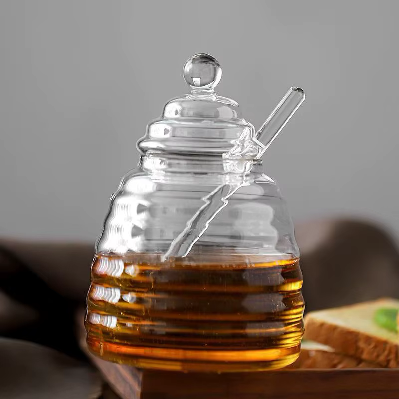Récipient de stockage de miel précieux en accent d'abeille en verre avec louche et couvercle