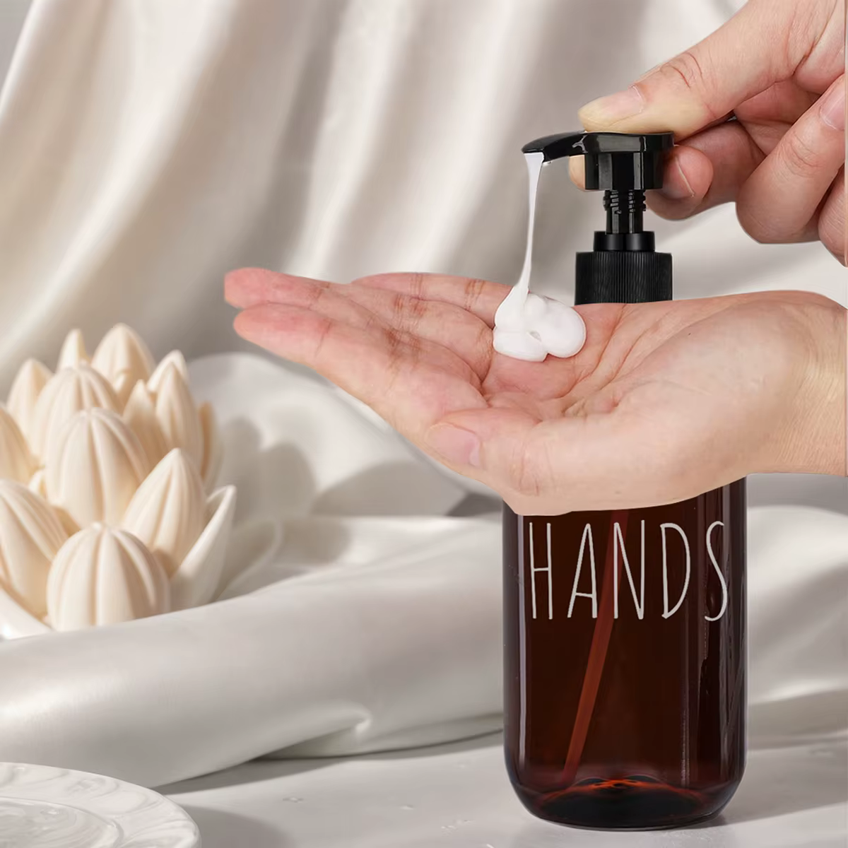Distributeur de savon pour les mains et la vaisselle