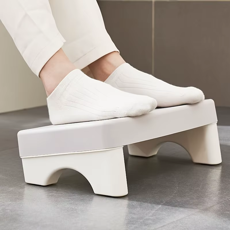 Repose-pieds ergonomique en PP pour bureau. Convient sous le bureau, à utiliser au travail, au canapé et à l'étude. Confortable et peu encombrant.