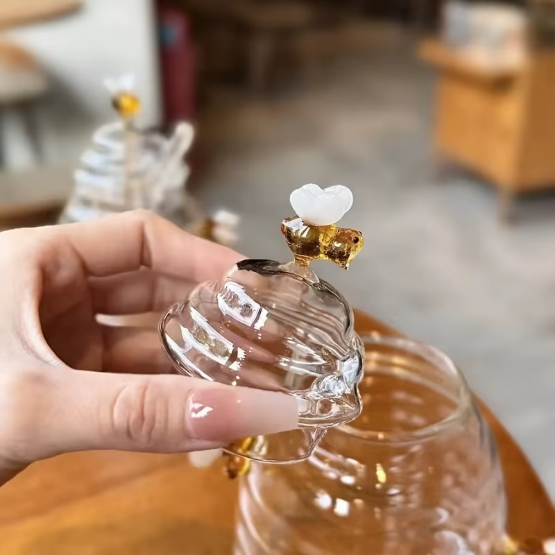 Pot à miel en verre avec cuillère et couvercle