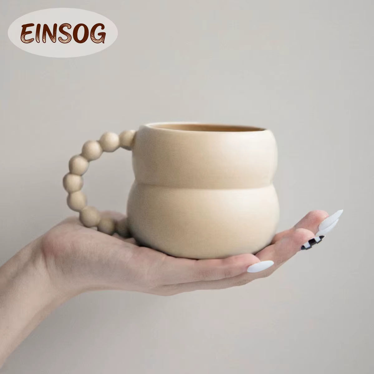 Tasse à café en céramique avec poignée boule