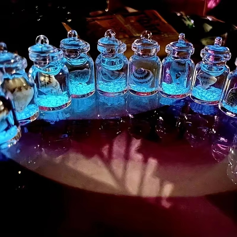 Conques lumineuses en bouteilles en verre transparent