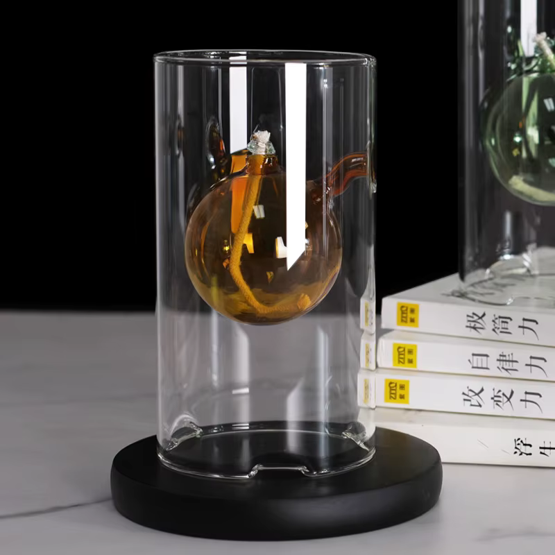 Lumière à huile en verre