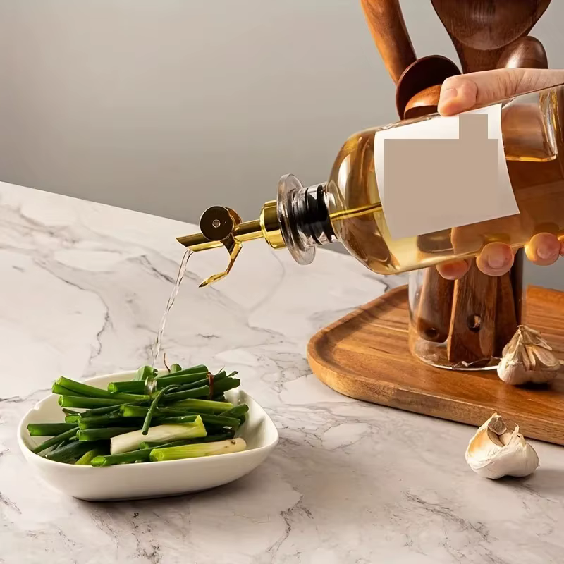 Bouteille distributrice d'huile d'olive en verre