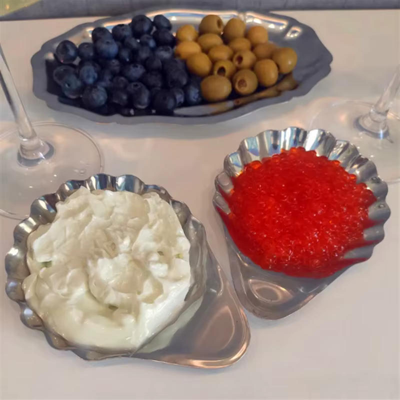 Assiette en acier inoxydable en forme de coquille