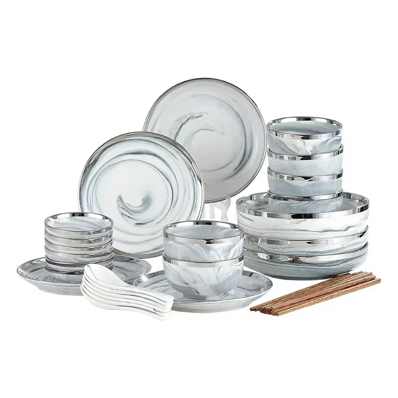 Assiettes en céramique de marbre avec bord argenté