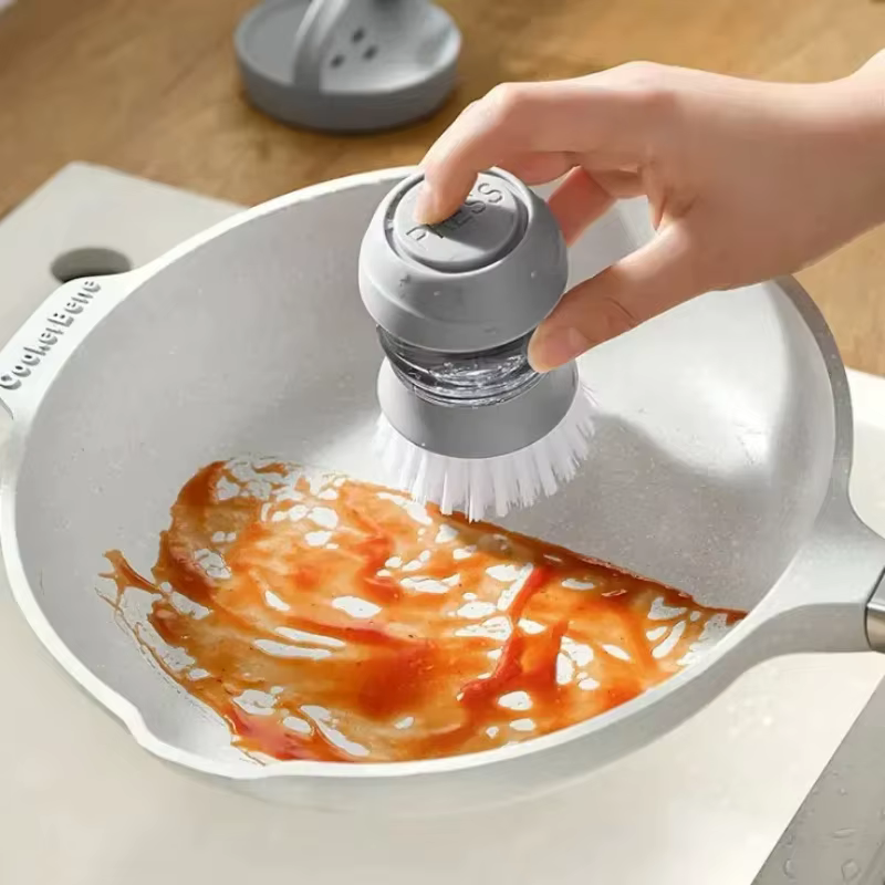 Brosse à vaisselle avec distributeur de savon