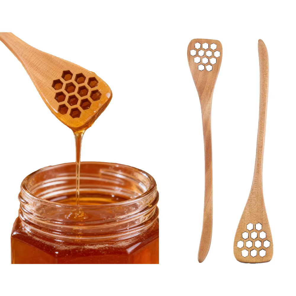 Cuillère à miel en forme de cœur en accent d'abeille