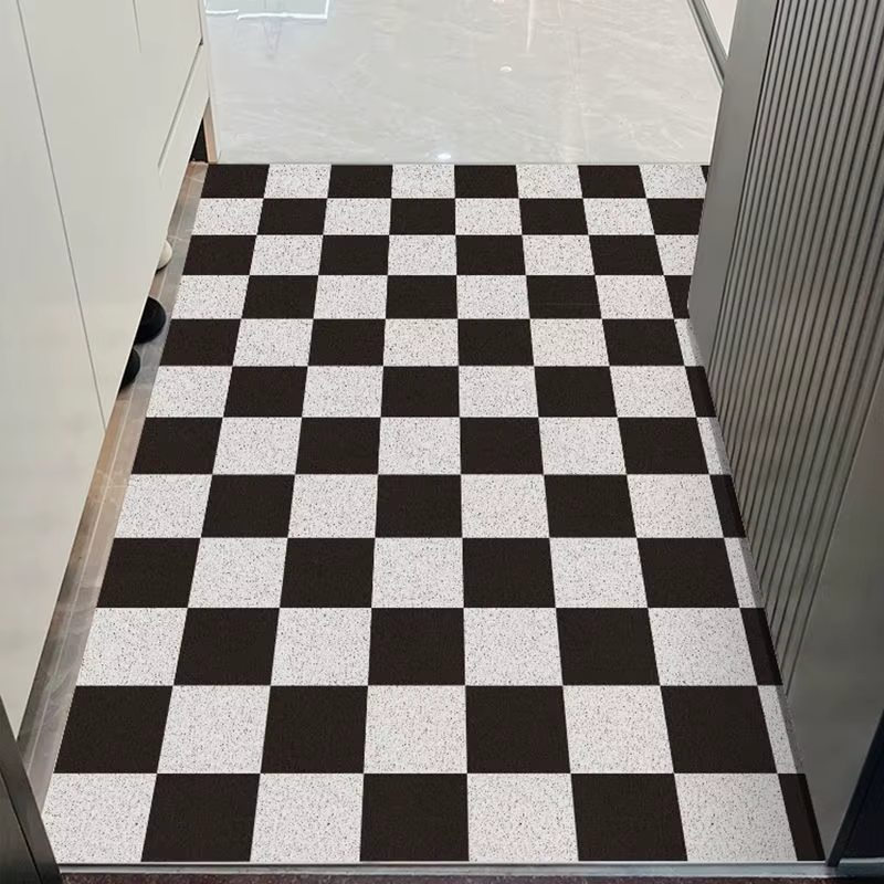 Le tapis de porte d'entrée peut être nettoyé avec un tapis de porte domestique en PVC. Le tapis d'entrée est un tapis de dessin animé résistant à la saleté