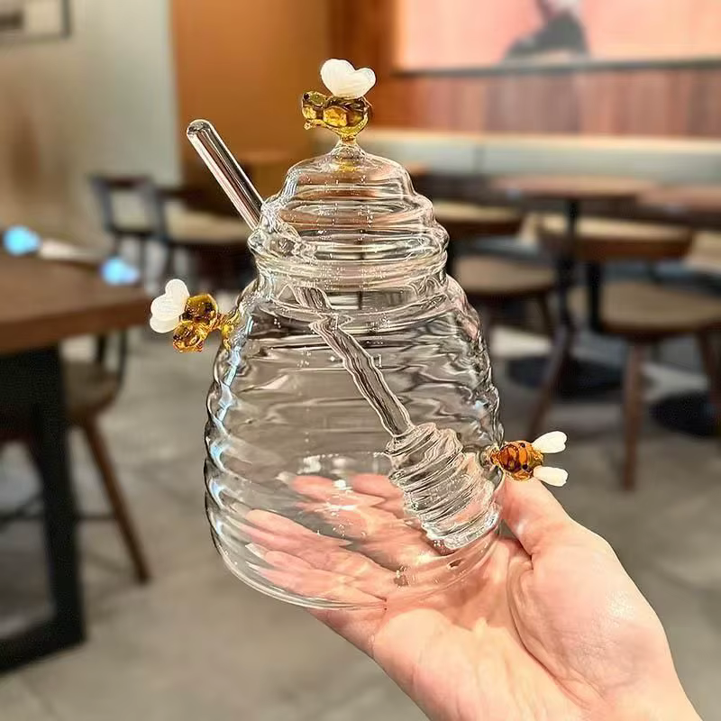 Pot à miel en verre avec cuillère et couvercle