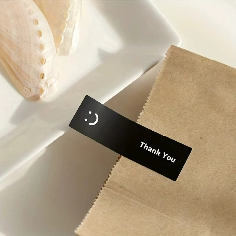Personnalité visage souriant merci pour sceller des cadeaux