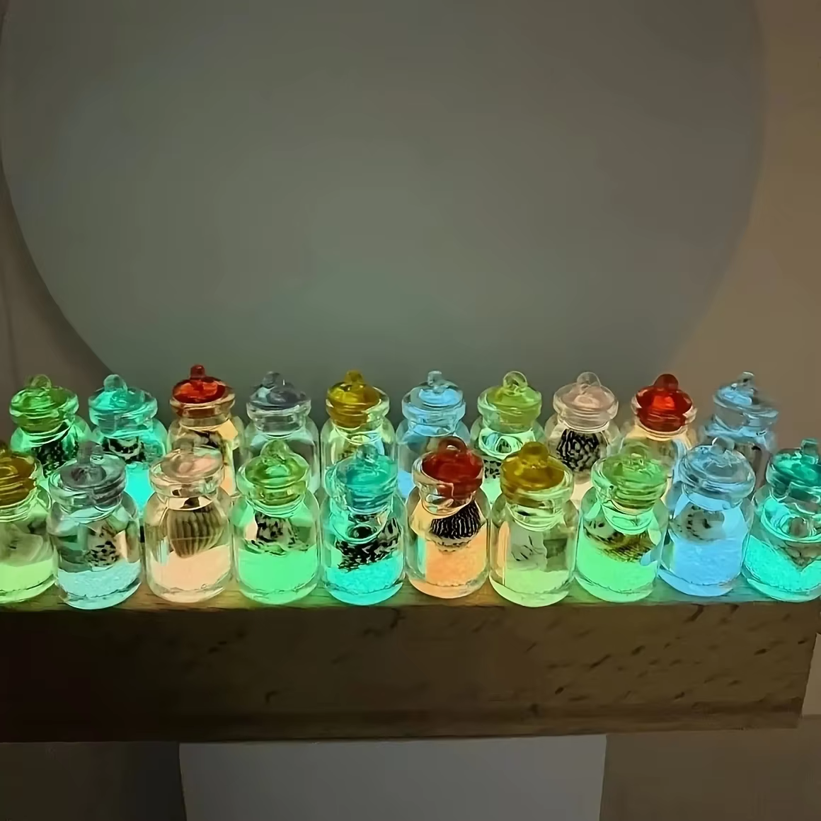 Conques lumineuses en bouteilles en verre transparent
