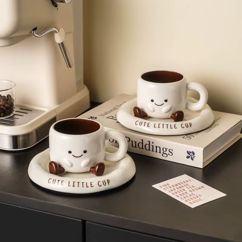 Mignonne petite tasse à café en céramique avec visage souriant et soucoupe, ensemble de tasses créatives de style dessin animé pour café, thé, lait