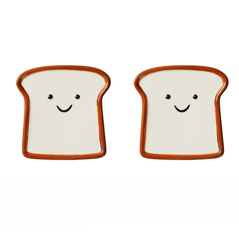 Assiettes en céramique en forme de pain grillé souriant