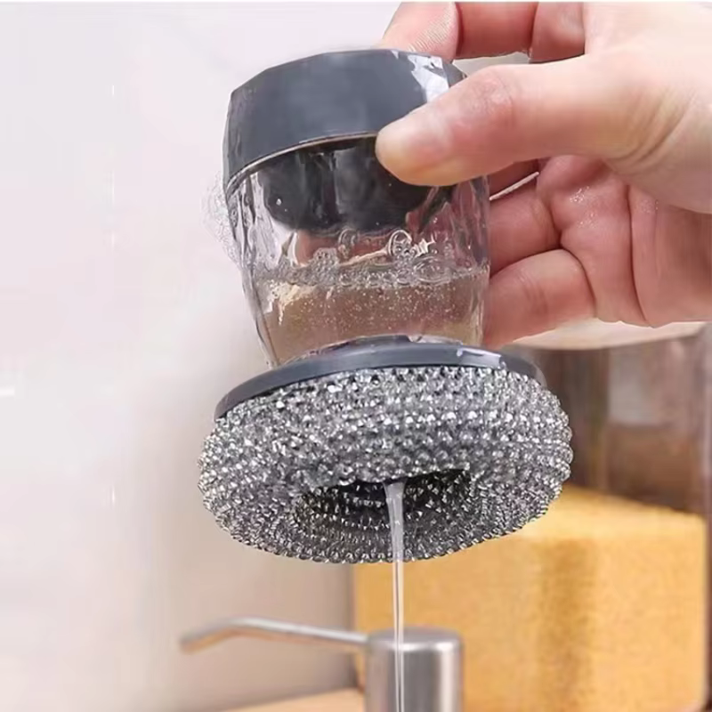 Brosse à vaisselle avec distributeur de liquide